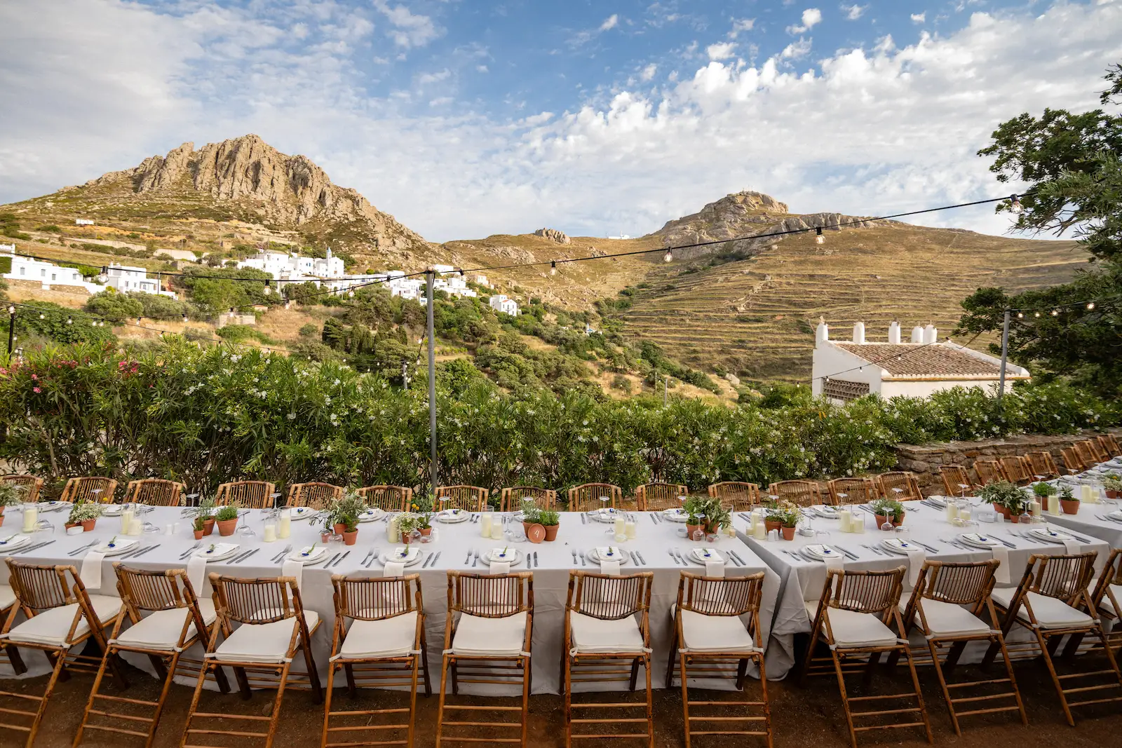 Wedding reception table overlooking the landscape of Tinos